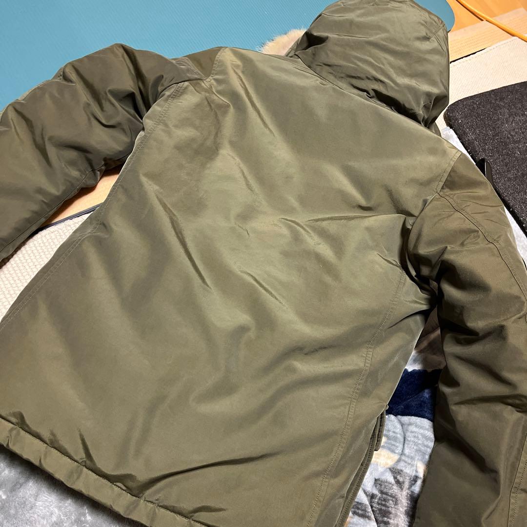 1/31まで。WOOLRICH オリーブ アークティックパーカー