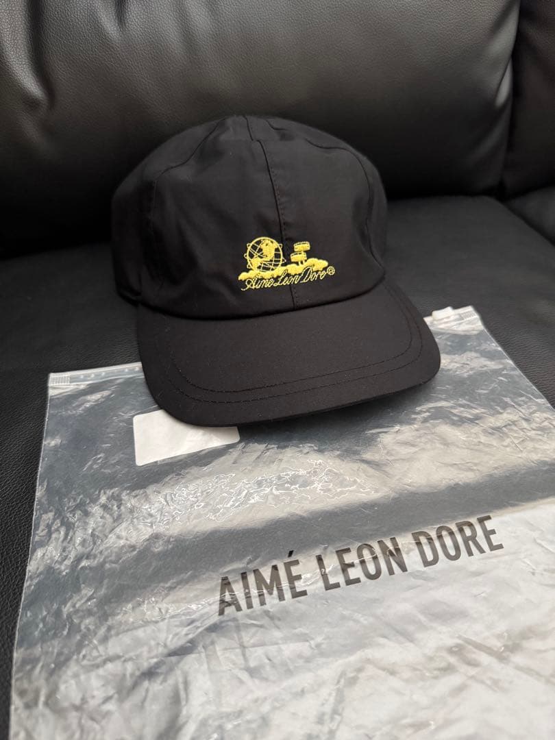 AIMÉ LEON DORE WATERPROOF SHELL CAP