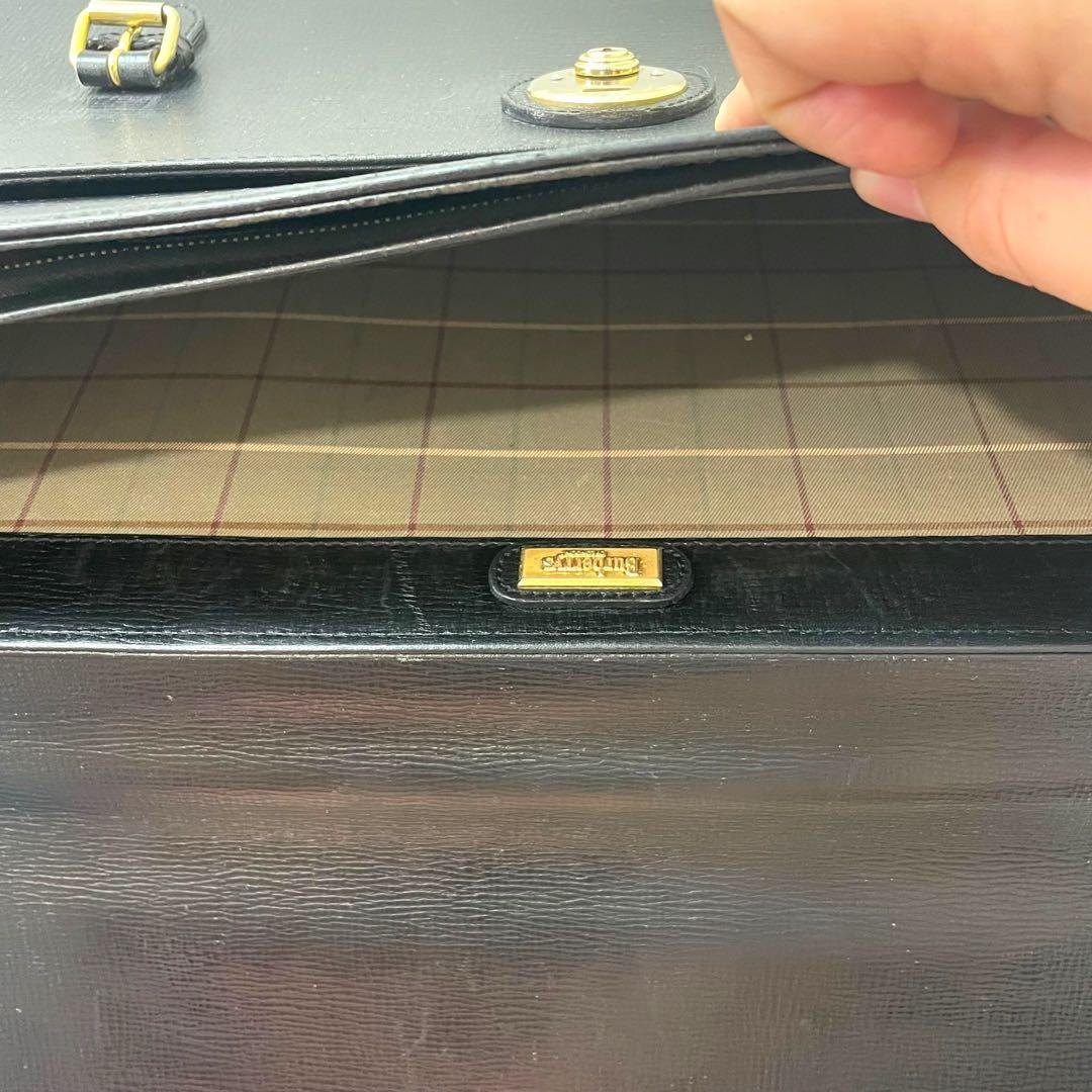 BURBERRY バーバリー　ビジネスバッグ 黒 オールレザー フラップ 金具
