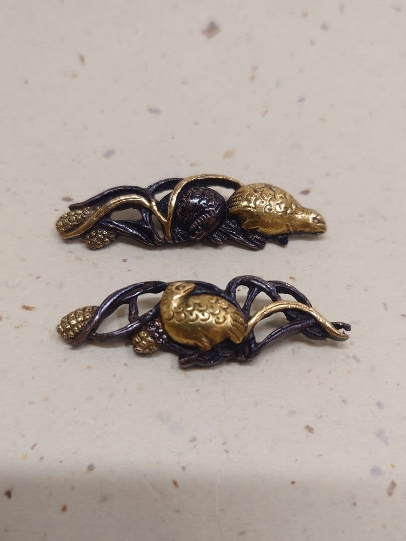 目貫、赤銅地に鶉に粟穂図