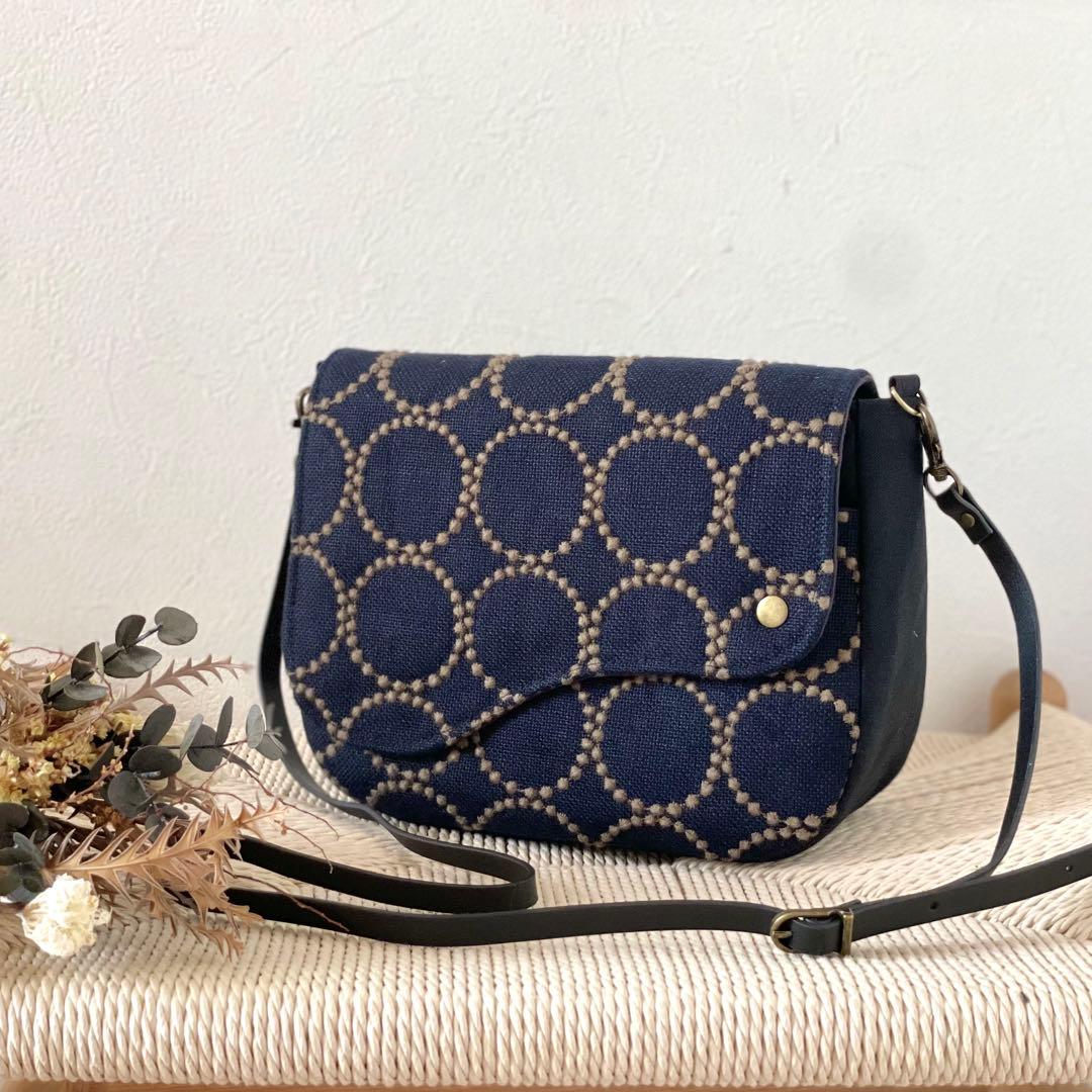 ⚮̈ミナペルホネン　tambourine いっぱいポッケのフラップポシェット