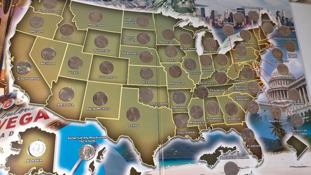 ♥♥。アメリカ25セントクォーター50州記念アルバム(56枚在中)。