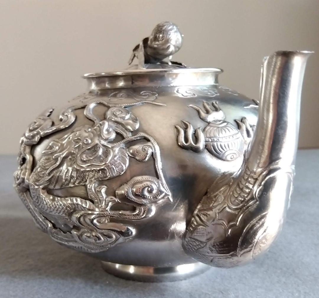 北京工芸品公司　銀製伝統雲龍紋唐獅子摘酒器　288gram高110長175mm