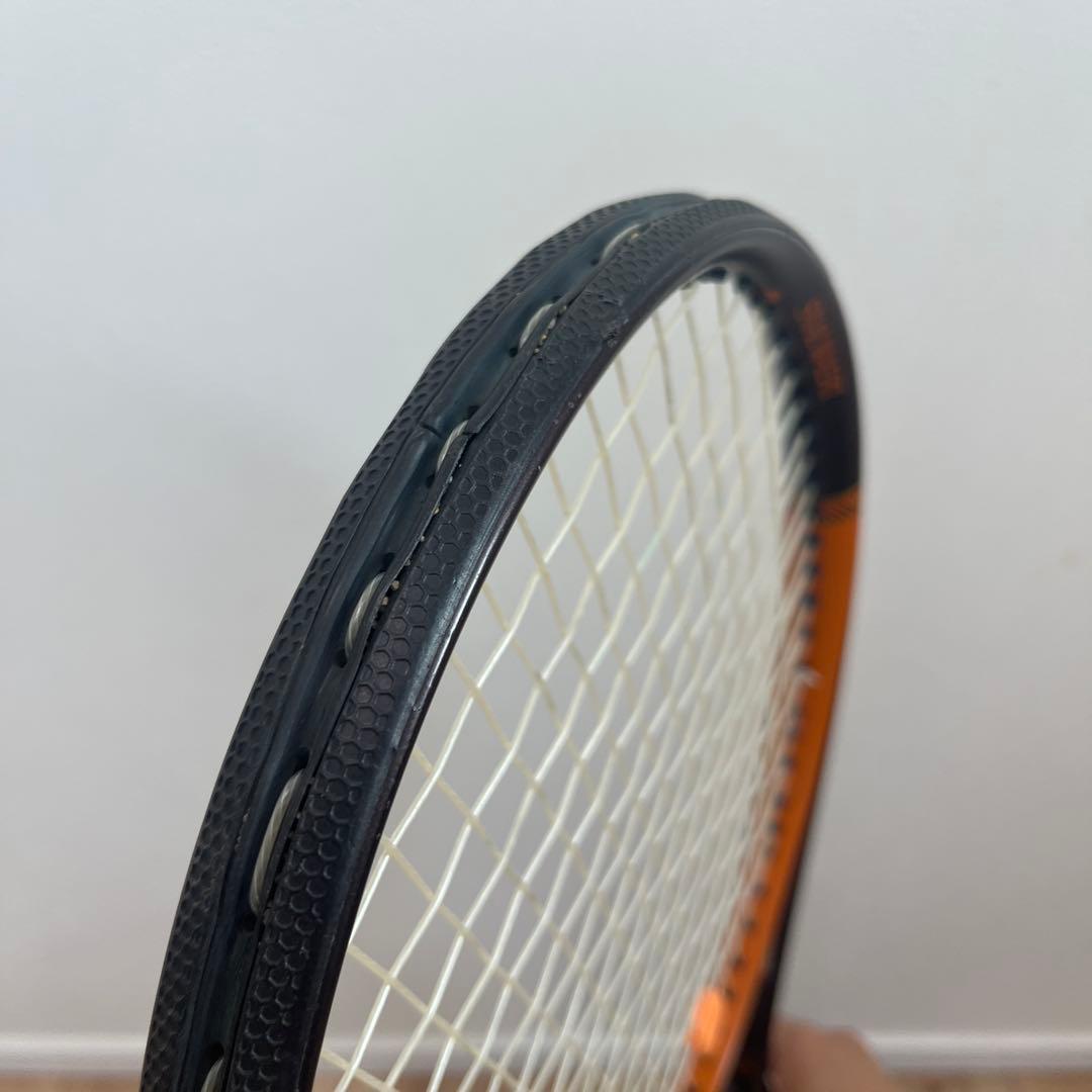 スノワート　テニスラケット カーボンファイバー 黒/オレンジ