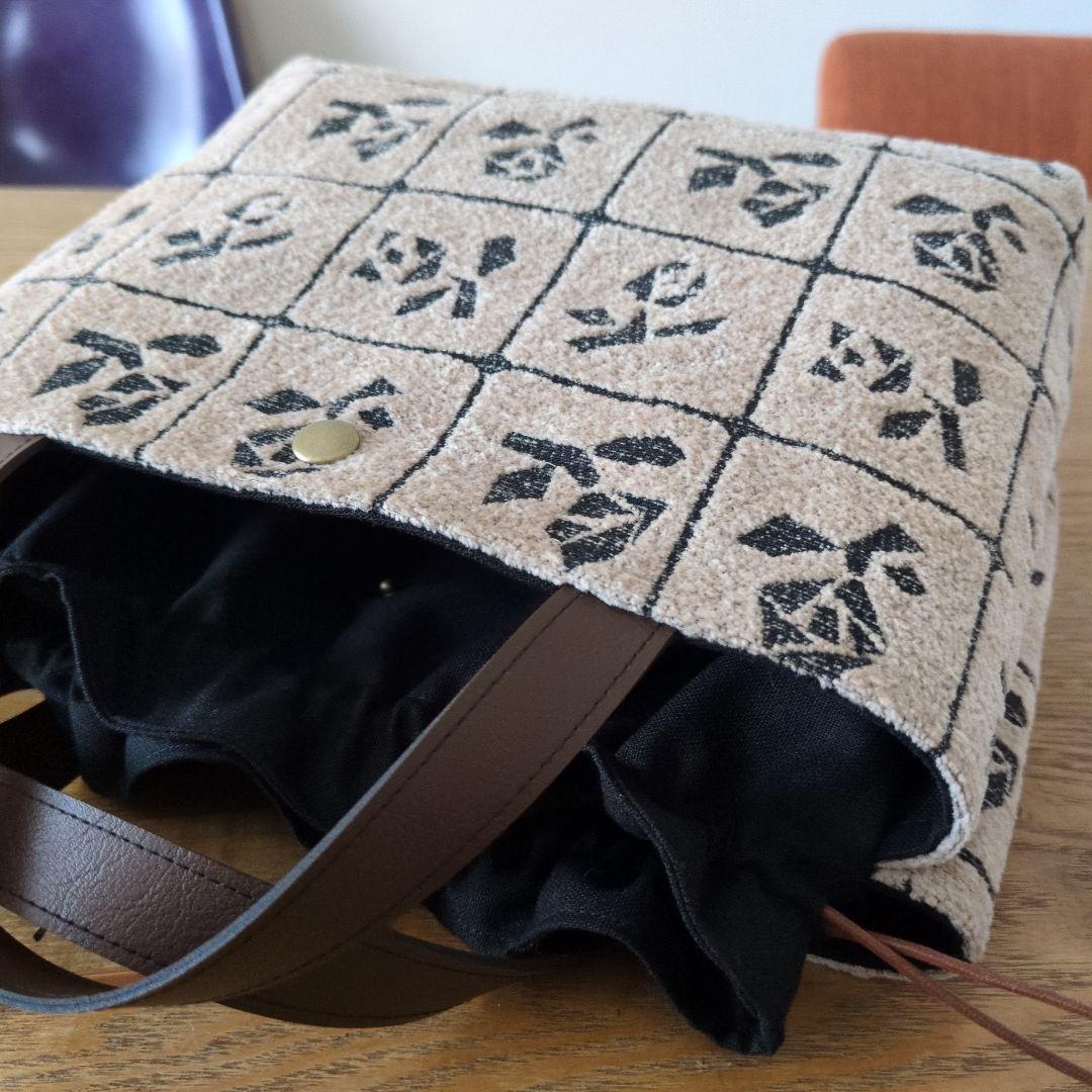 【1551】あおりポケットの巾着バッグ＊ミナペルホネン